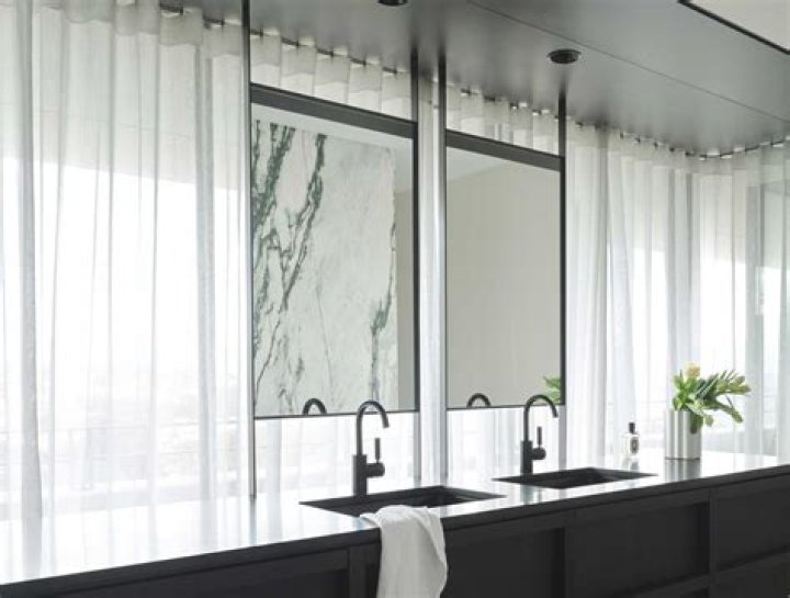 Should mirrors face windows?